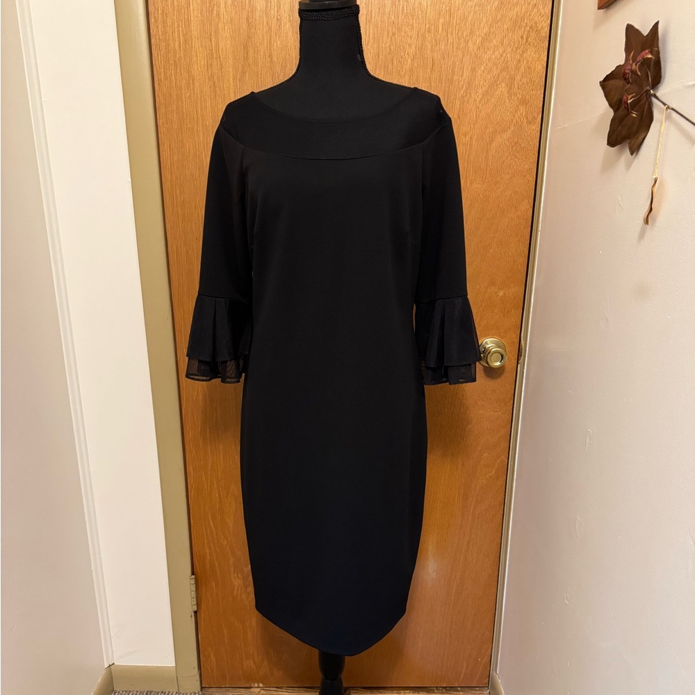 Sz12 Calvin Klein black silhouette sheath dress with netted crew neckline. NWOT🐸